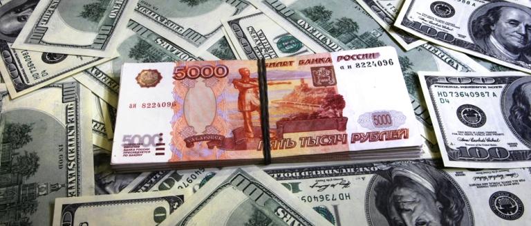Официальный курс доллара в РФ упал до 58 рублей