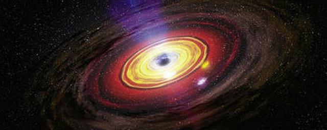 Астрономы нашли галактику с выдавленной из ее центра черной дырой