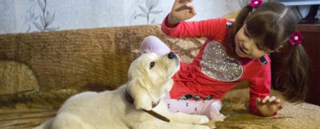 Путин подарил щенка больной аутизмом девочке