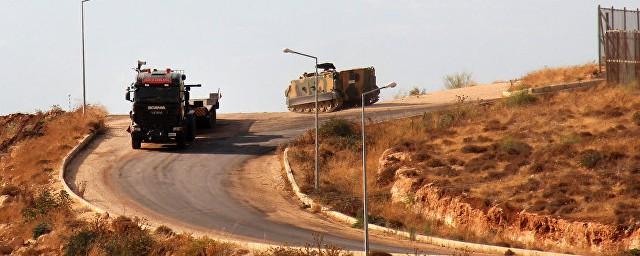 Турция стянула военную технику к границе с Сирией