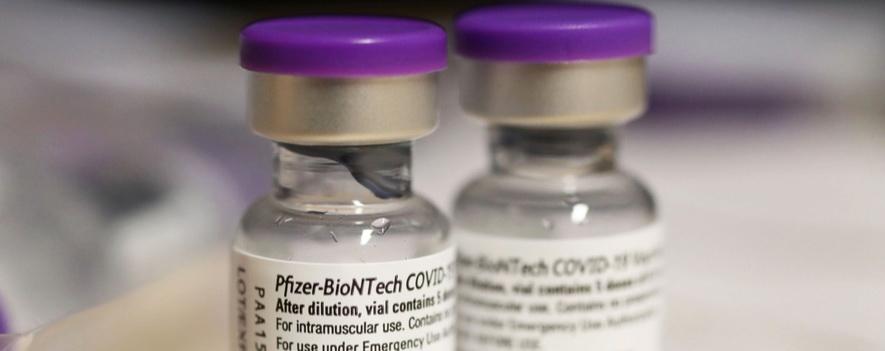 Pfizer повысила прогноз по продажам вакцины от ковида