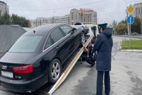«Дорожный пристав» в деле: хроника изъятия 21 автомобиля в Новосибирске