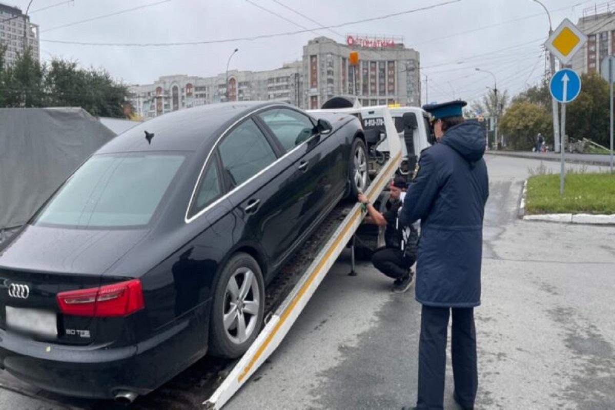«Дорожный пристав» в деле: хроника изъятия 21 автомобиля в Новосибирске