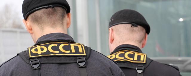 В Красноярске судебные приставы вернули госуниверситету помещения, занимаемые похоронной фирмой