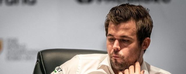 Norwegian Carlsen defended his title ahead of schedule by beating Nepomniachtchi in the 11th game