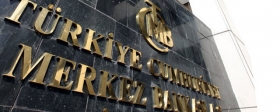 Turkey's central bank cuts key rate to 9% despite inflation