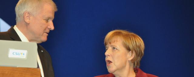 Меркель поручили за две недели решить проблему беженцев
