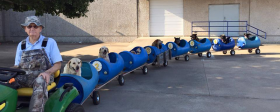 An 80-year-old Texas resident built a train for homeless dogs