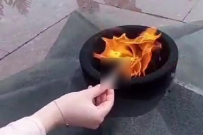 A case has been opened in Sakhalin over a video of a girl lighting a cigarette from the Eternal Flame, with townspeople condemning the cynical act