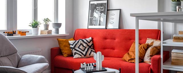 Красный цвет сделает интерьер вашей гостиной особенно эффектным